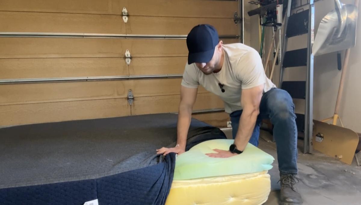 Mattress cut open showing internal foam layers where mold growth often hides undetected